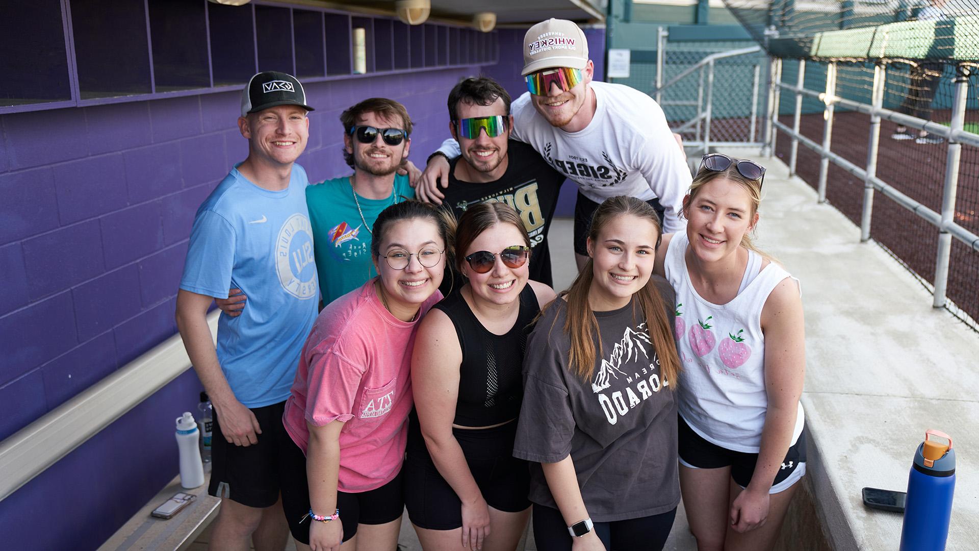 Students at baseball field bunker