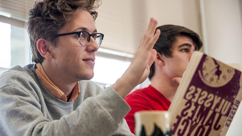 Student holding Ulysses book